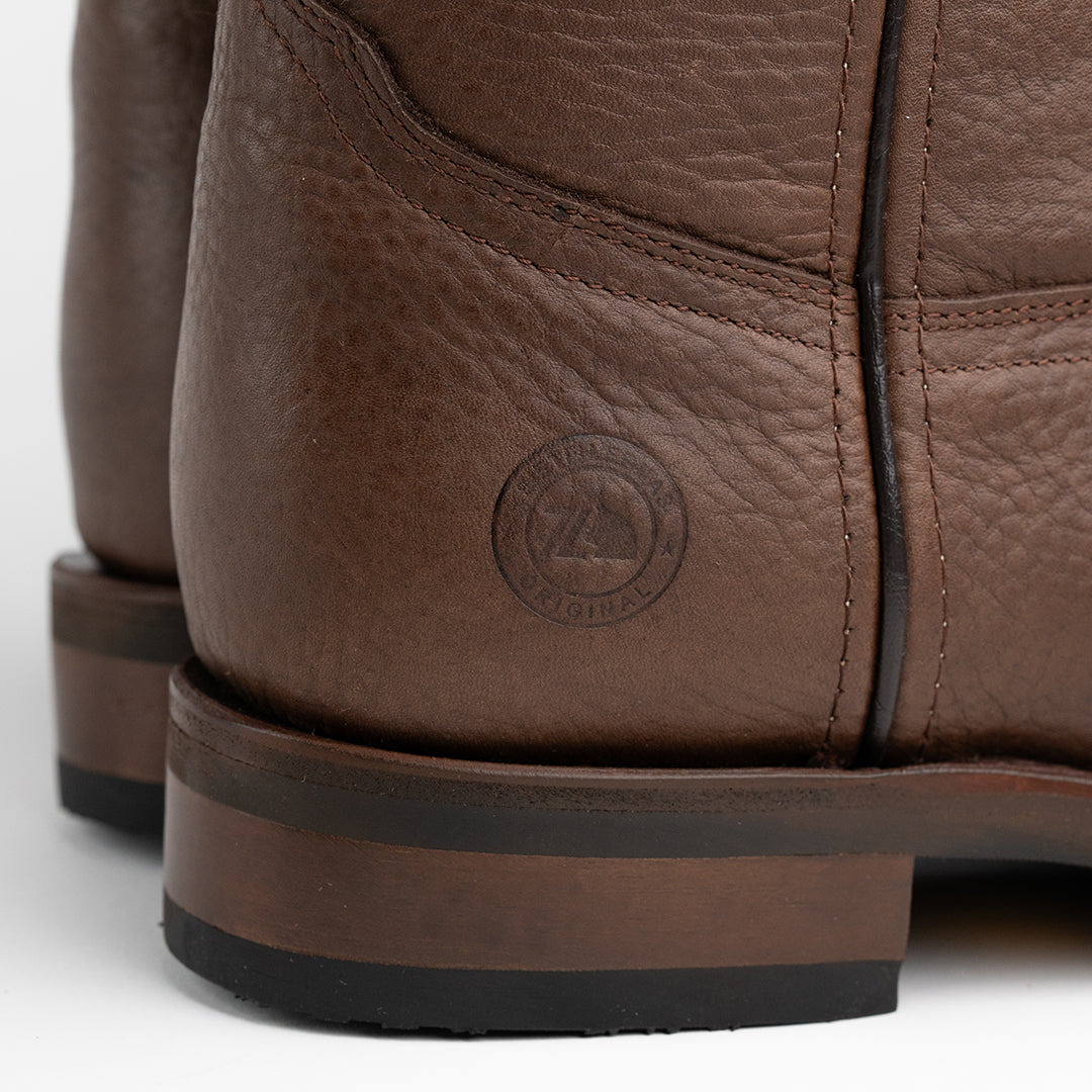 Detalle del tobillo y tacón de la Bota Vaquera con Suela de Hule Vibram y Piel Tabaco Siete Leguas, con método de construcción Goodyear-Welt para máxima seguridad y estabilidad, disponible en Boot Place.
