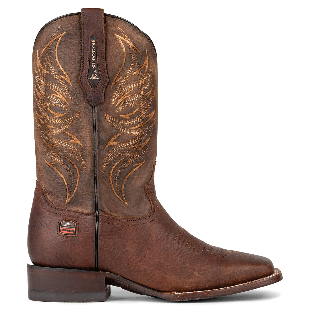 Vista lateral de la Bota Vaquera Rio Grande Fenix, mostrando su diseño funcional y suela híbrida, disponible en Boot Place.